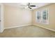 Bedroom featuring large windows and a ceiling fan at 503 Kensington Estates Trce, Woodstock, GA 30188