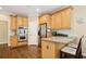 Kitchen with stainless steel appliances, double oven and breakfast bar at 503 Kensington Estates Trce, Woodstock, GA 30188