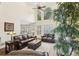 Spacious living room with high ceilings and large windows offering natural light at 503 Kensington Estates Trce, Woodstock, GA 30188