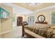 Bright and spacious main bedroom with natural light and access to the bathroom at 503 Kensington Estates Trce, Woodstock, GA 30188