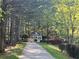 Enjoy a tranquil walk on the paved trail leading to the community gazebo at 5620 Moresby Ct, Alpharetta, GA 30022