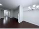 Spacious living room featuring hardwood floors and neutral paint, perfect for modern living at 5620 Moresby Ct, Alpharetta, GA 30022
