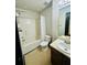 Bathroom featuring a tub/shower combo, toilet, and vanity at 225 Colser Dr, Covington, GA 30016