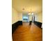 Bright dining room with hardwood floors, wainscoting, and a stylish chandelier at 225 Colser Dr, Covington, GA 30016