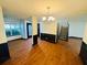 Spacious living area with hardwood floors, and stairs leading to upper level at 225 Colser Dr, Covington, GA 30016