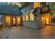 Spacious back deck with access to the home's interior and outdoor lounging at 2655 Boulder Creek Ne Dr, Roswell, GA 30075