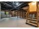 Unfinished basement showing the framework with exposed ceiling and stairs at 2655 Boulder Creek Ne Dr, Roswell, GA 30075