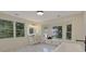 Well-lit bathroom with large windows, a double vanity, and a built-in window seat beneath the windows at 2655 Boulder Creek Ne Dr, Roswell, GA 30075