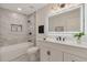 Modern bathroom showcasing a marble-tiled shower and updated vanity at 2655 Boulder Creek Ne Dr, Roswell, GA 30075