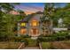 Beautiful two-story home with large windows and landscaped front yard at 2655 Boulder Creek Ne Dr, Roswell, GA 30075