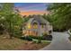 Charming two-story home with mature trees and a long driveway at 2655 Boulder Creek Ne Dr, Roswell, GA 30075