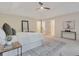 Main bedroom features neutral colors, a large rug, and a streamlined design at 2655 Boulder Creek Ne Dr, Roswell, GA 30075