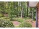 Large, grassy backyard with mature trees at 3792 Harts Mill Ne Ln, Brookhaven, GA 30319