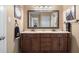 Bathroom features dual sinks, vanity with cabinetry and granite countertop at 3792 Harts Mill Ne Ln, Brookhaven, GA 30319