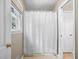 Bathroom with shower/tub combination and neutral finishes at 3792 Harts Mill Ne Ln, Brookhaven, GA 30319