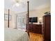 Bedroom with french doors, hardwood floors, and a ceiling fan at 3792 Harts Mill Ne Ln, Brookhaven, GA 30319