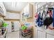 Laundry room with white cabinets and a window at 3792 Harts Mill Ne Ln, Brookhaven, GA 30319