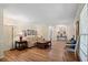 Comfortable living room with hardwood floors, a neutral color palette, and lots of natural light at 3792 Harts Mill Ne Ln, Brookhaven, GA 30319