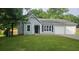 Charming single-story home with a well-manicured lawn and attached garage, perfect for suburban living at 4052 Keheley Glen Ne Dr, Marietta, GA 30066