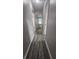 Hallway features plank flooring and neutral paint at 4052 Keheley Glen Ne Dr, Marietta, GA 30066