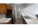 Kitchen with new gray vinyl floors and counter space at 4052 Keheley Glen Ne Dr, Marietta, GA 30066