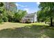 Spacious backyard offering plenty of room for recreation and enjoying the natural surroundings at 5150 Shadow Path Sw Ln, Lilburn, GA 30047