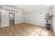 Spacious bedroom featuring hardwood floors, chandelier lighting, recessed lights, and an ensuite bathroom at 5150 Shadow Path Sw Ln, Lilburn, GA 30047