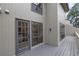 Balcony with gray wood flooring and view of kitchen through windows and door at 683 Highland Ct, Marietta, GA 30068