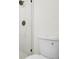 Modern bathroom featuring a white toilet with white marble tiled shower at 683 Highland Ct, Marietta, GA 30068