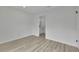 Bedroom with wood-look laminate flooring leading to an en suite bathroom at 683 Highland Ct, Marietta, GA 30068
