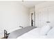 Bright bedroom featuring a walk in closet and a neutral color scheme at 7130 Summit Pl, Alpharetta, GA 30009