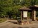The Big Creek Greenway trail with a map kiosk and covered picnic area at 7130 Summit Pl, Alpharetta, GA 30009