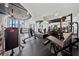 Well-equipped fitness center with modern machines, weights, and mirrors for residents' health and wellness at 860 Peachtree Ne St # 1513, Atlanta, GA 30308