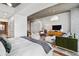 Bright and airy main bedroom featuring a comfortable bed and city views at 860 Peachtree Ne St # 1513, Atlanta, GA 30308