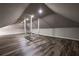 Spacious attic with hardwood flooring and neutral walls at 1029 Katherwood Sw Dr, Atlanta, GA 30310
