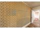 Bedroom showing wallpapered accent wall and wood-look flooring at 1029 Katherwood Sw Dr, Atlanta, GA 30310