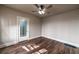 Bedroom with wood-look floors, ceiling fan and an entry to a closet at 1029 Katherwood Sw Dr, Atlanta, GA 30310