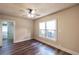 Bright bedroom with hardwood floors, ceiling fan, and a double window for ample light at 1029 Katherwood Sw Dr, Atlanta, GA 30310