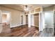 Bedroom with wood-look floors, a ceiling fan and custom built-in wardrobe at 1029 Katherwood Sw Dr, Atlanta, GA 30310