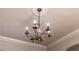 Close up of ceiling with decorative medallion and vintage chandelier lighting at 1029 Katherwood Sw Dr, Atlanta, GA 30310