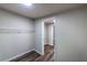 Walk-in closet with shelving and hardwood floors, offering ample storage space at 1029 Katherwood Sw Dr, Atlanta, GA 30310