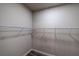 Walk-in closet with shelving and wood-look flooring at 1029 Katherwood Sw Dr, Atlanta, GA 30310