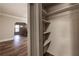 Hallway with wooden shelves and arched doorway at 1029 Katherwood Sw Dr, Atlanta, GA 30310