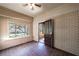 Bright sun room features tiled floors, white walls, large window, and view of porch at 1029 Katherwood Sw Dr, Atlanta, GA 30310