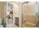 Bathroom with shower and view into bedroom at 2080 Old Dominion Rd, Atlanta, GA 30350