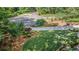Well-manicured front yard with beautiful landscaping and a circular driveway at 2080 Old Dominion Rd, Atlanta, GA 30350