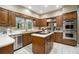 Modern kitchen with stainless steel appliances, island cooktop, and sleek cabinetry at 2080 Old Dominion Rd, Atlanta, GA 30350