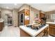 Well-appointed kitchen featuring stainless steel appliances, tile floors, and an adjacent dining area at 2080 Old Dominion Rd, Atlanta, GA 30350