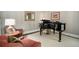 Elegant living room featuring a grand piano and stylish seating at 2080 Old Dominion Rd, Atlanta, GA 30350
