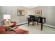 Living room with a grand piano, seating and carpeting at 2080 Old Dominion Rd, Atlanta, GA 30350